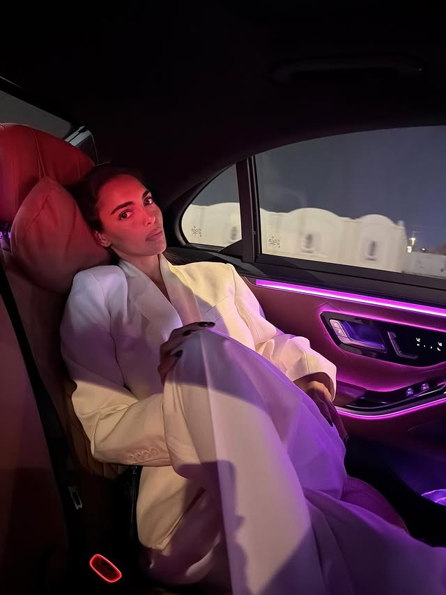 Instagram post by @sandrashehab for Visit Qatar. Caption reads: I <3 u Qatar 🏎️❤️.