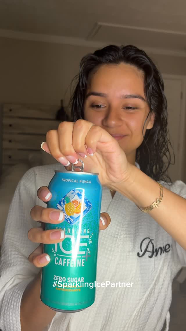 Instagram post by @amer.valencia for Her Campus. Caption reads: #sparklingicepartner GRWM for an 8am flight ✈️....