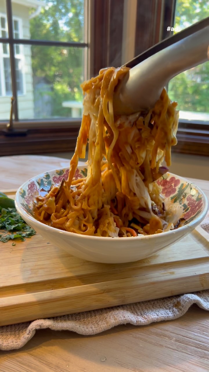 Instagram post by @gatherednutrition for Kikkoman USA. Caption reads: The BEST ever peanut noodles with veggies and....