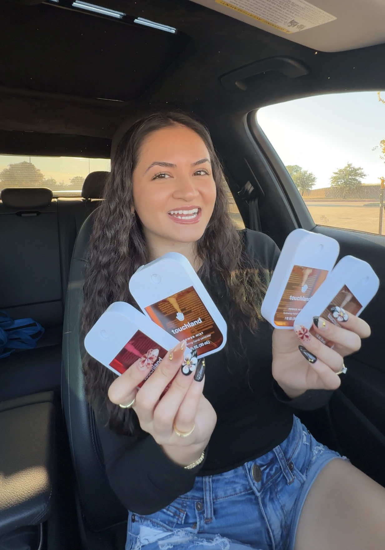 TikTok post by @melisssaaxm for Touchland. Caption reads: I always have @touchland hand sanitizer with me....