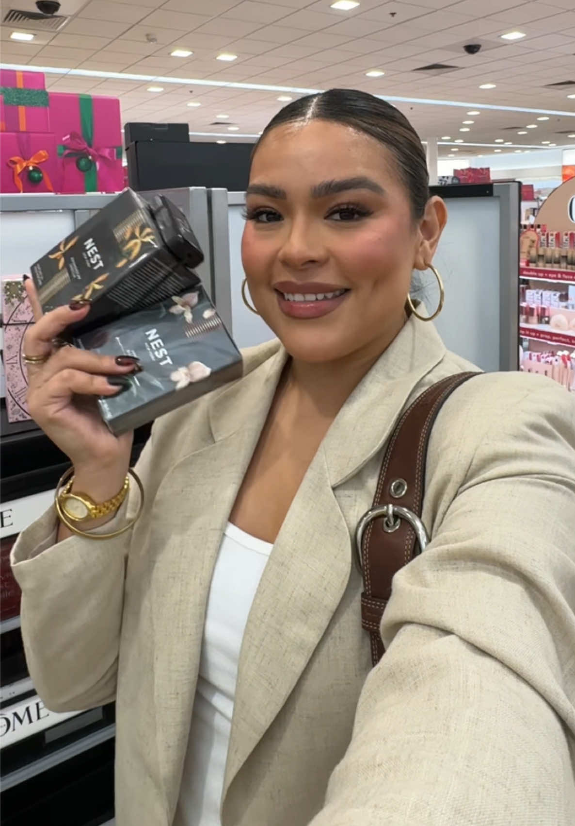 TikTok post by @mvrubi for NEST New York. Caption reads: [...] and Vanilla Bourbon Eau de Parfum by @NEST....