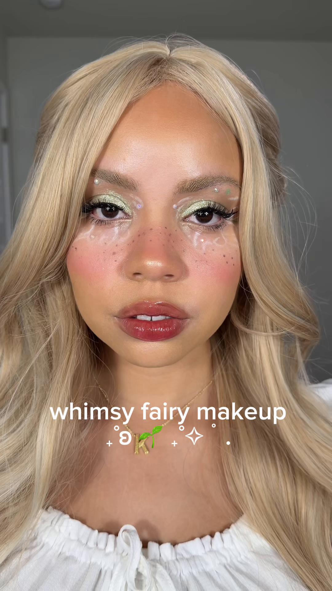TikTok post by @chicwithkels for Girlcult Cosmetics. Caption reads: [...] highlighter - haloed eyes • @Girlcult....