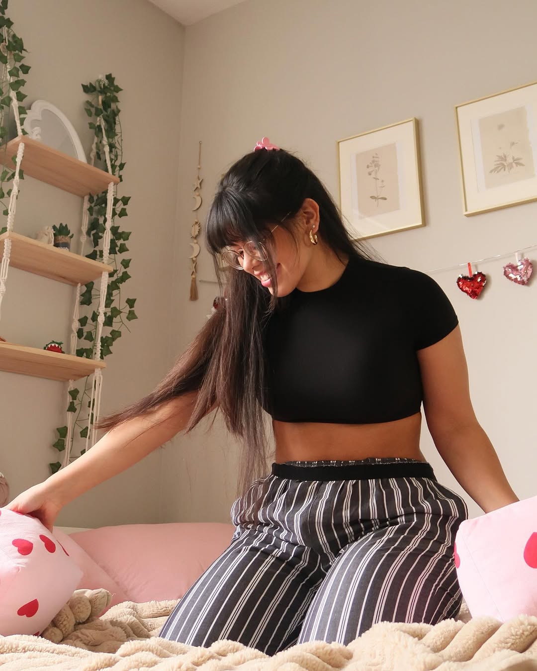 Instagram post by @hannahncortez for vspink. Caption reads: Life can take you many places…but my bed is....