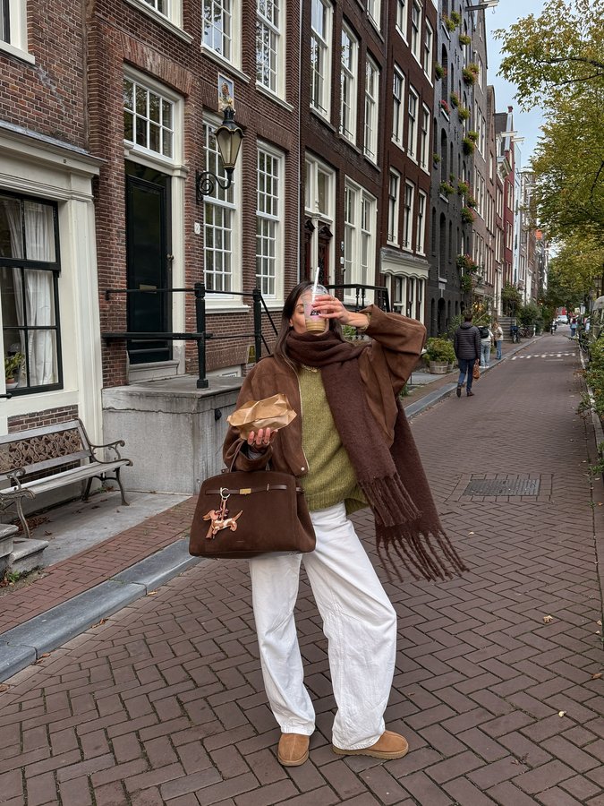 Instagram post by @anneorion for Spartoo. Caption reads: green + brown for fall 🤎🫒💌.