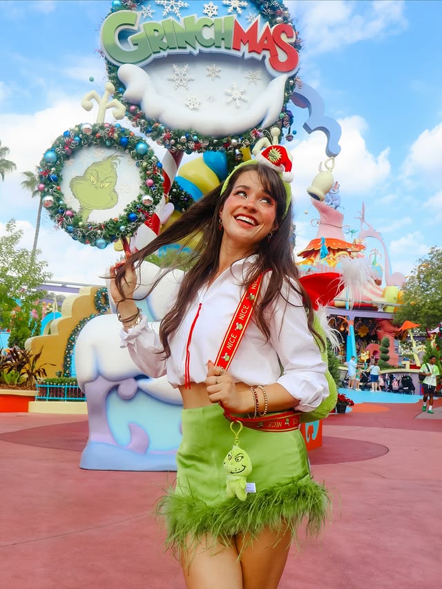 Instagram post by @magicwithmeg for Universal Orlando Resort. Caption reads: and her heart grew three sizes 💚♥️ #hosted....