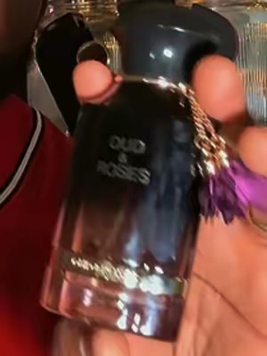 TikTok post by @swaggdaddy031 for PerfumeboxUSA. Caption reads: Nice introduction to a everyday Oud @perfumeboxusa....