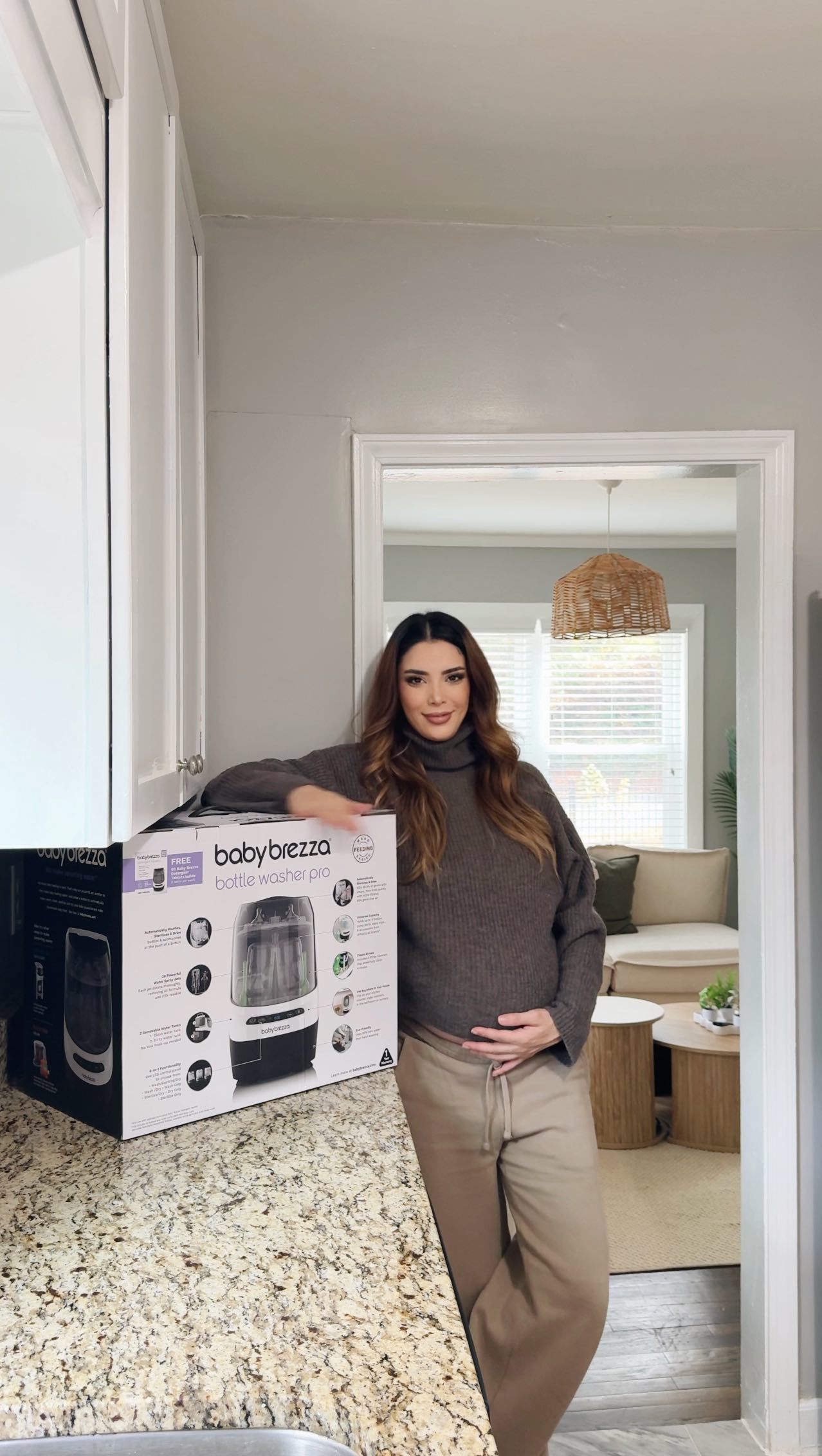 Instagram post by @kvncozkya for Baby Brezza. Caption reads: Keeping baby bottles clean has never been easier....