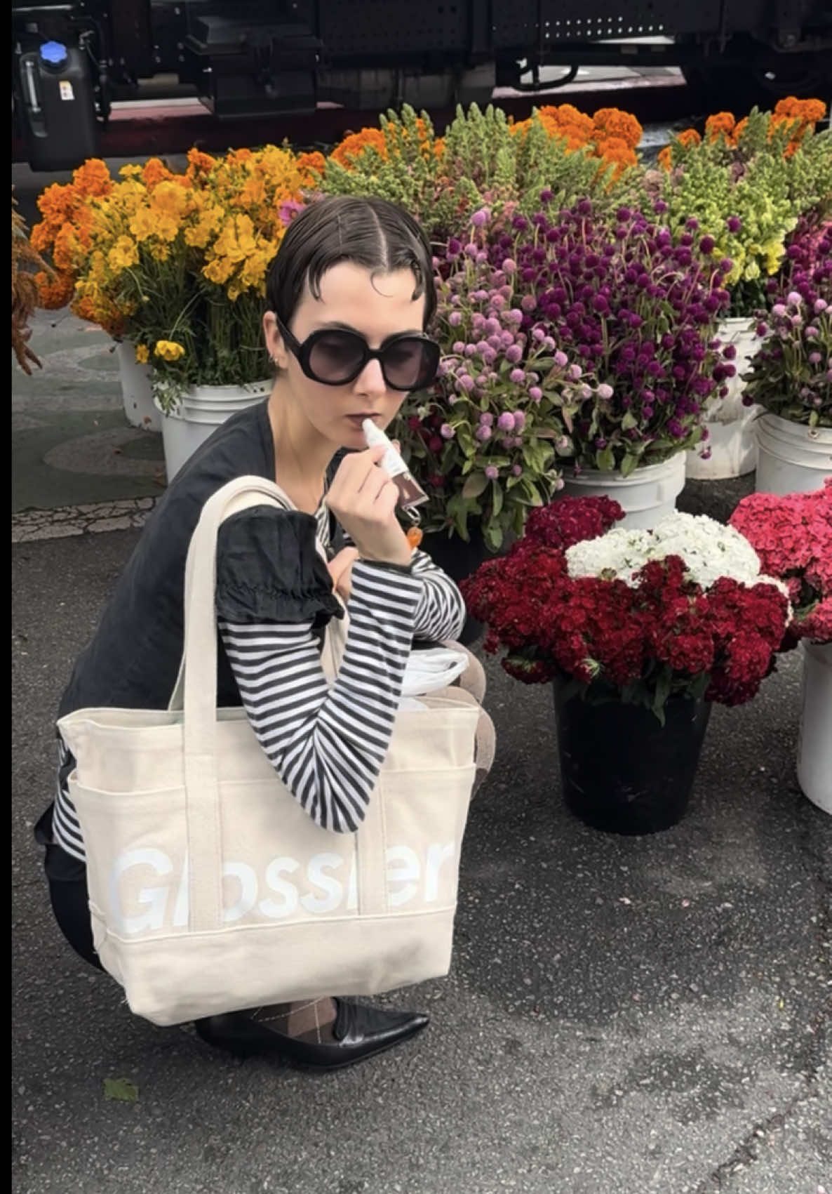 TikTok post by @yungkombucha420 for Glossier. Caption reads: Fall farmers market trip @Glossier....