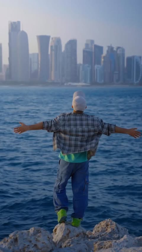 Instagram post by @khan.isa for Visit Qatar. Caption reads: [...] In Qatar, it all felt familiar again.....