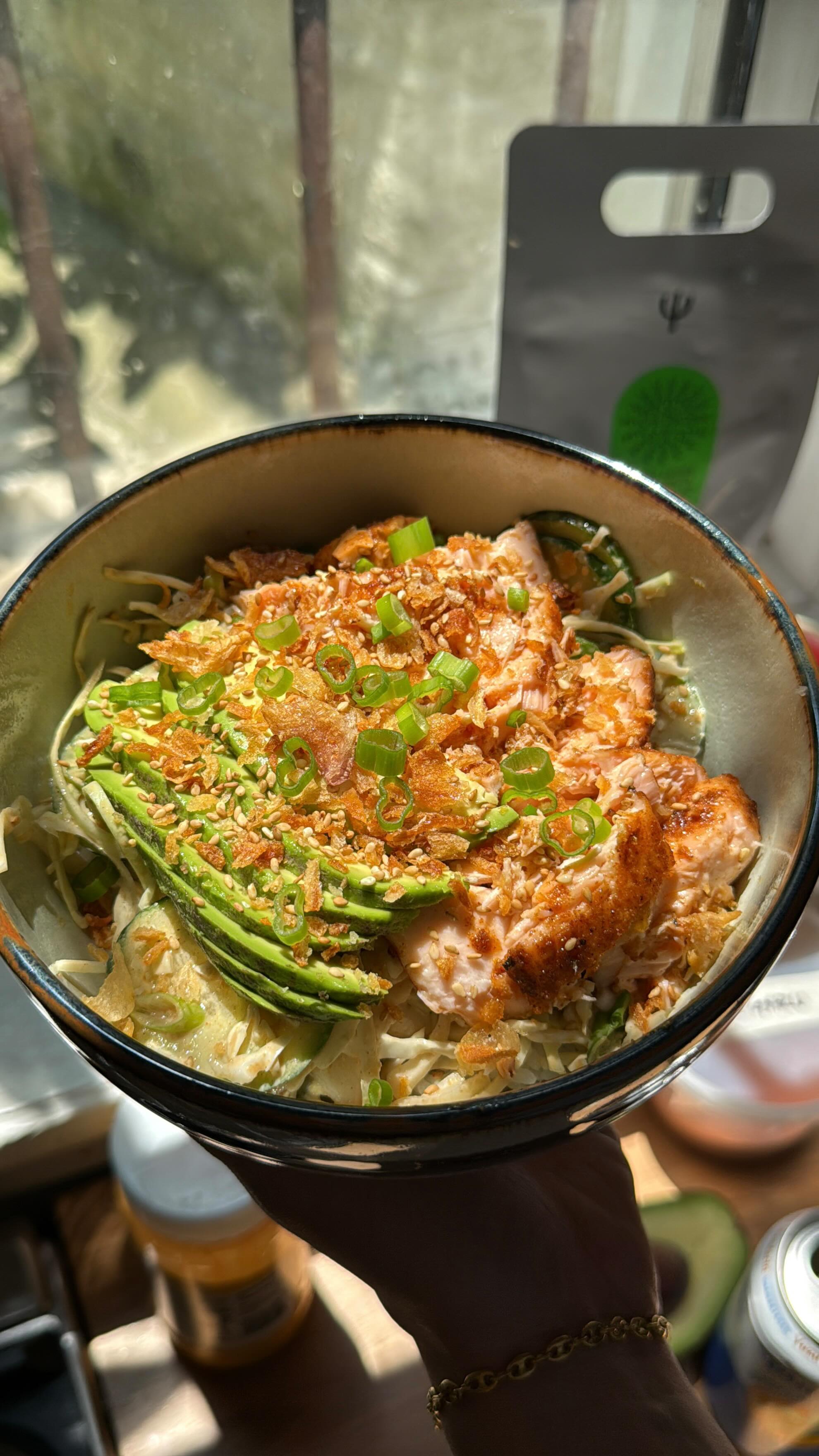 Instagram post by @cabagges.world for Spindrift. Caption reads: Spicy salmon rice bowl with a yuzu sesame....