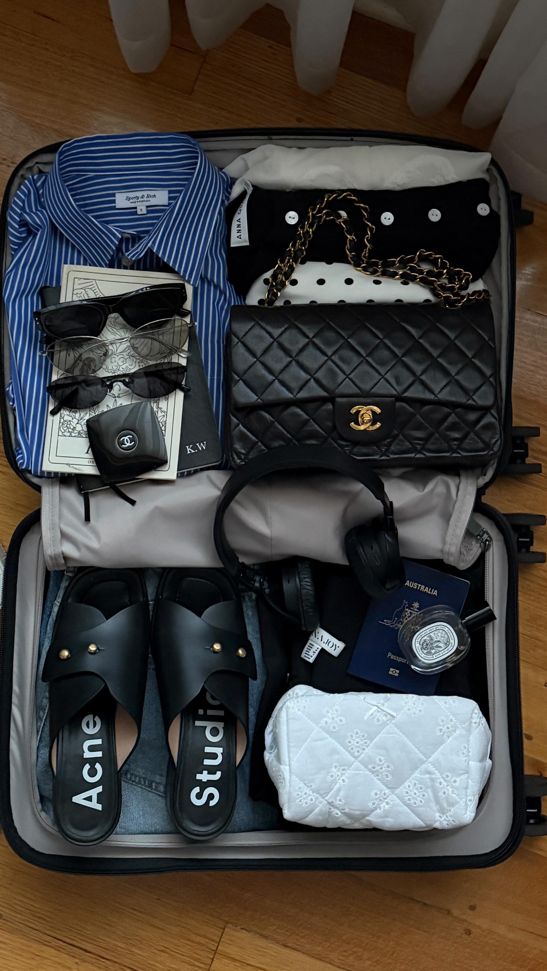 Instagram post by @kristywho for Antler. Caption reads: [...] an expandable suitcase = my travel hack....