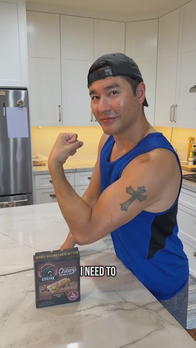 Instagram post by @athomewithbryanofficial for Kodiak Cakes. Caption reads: #KodiakPartner Having protein before I workout is....