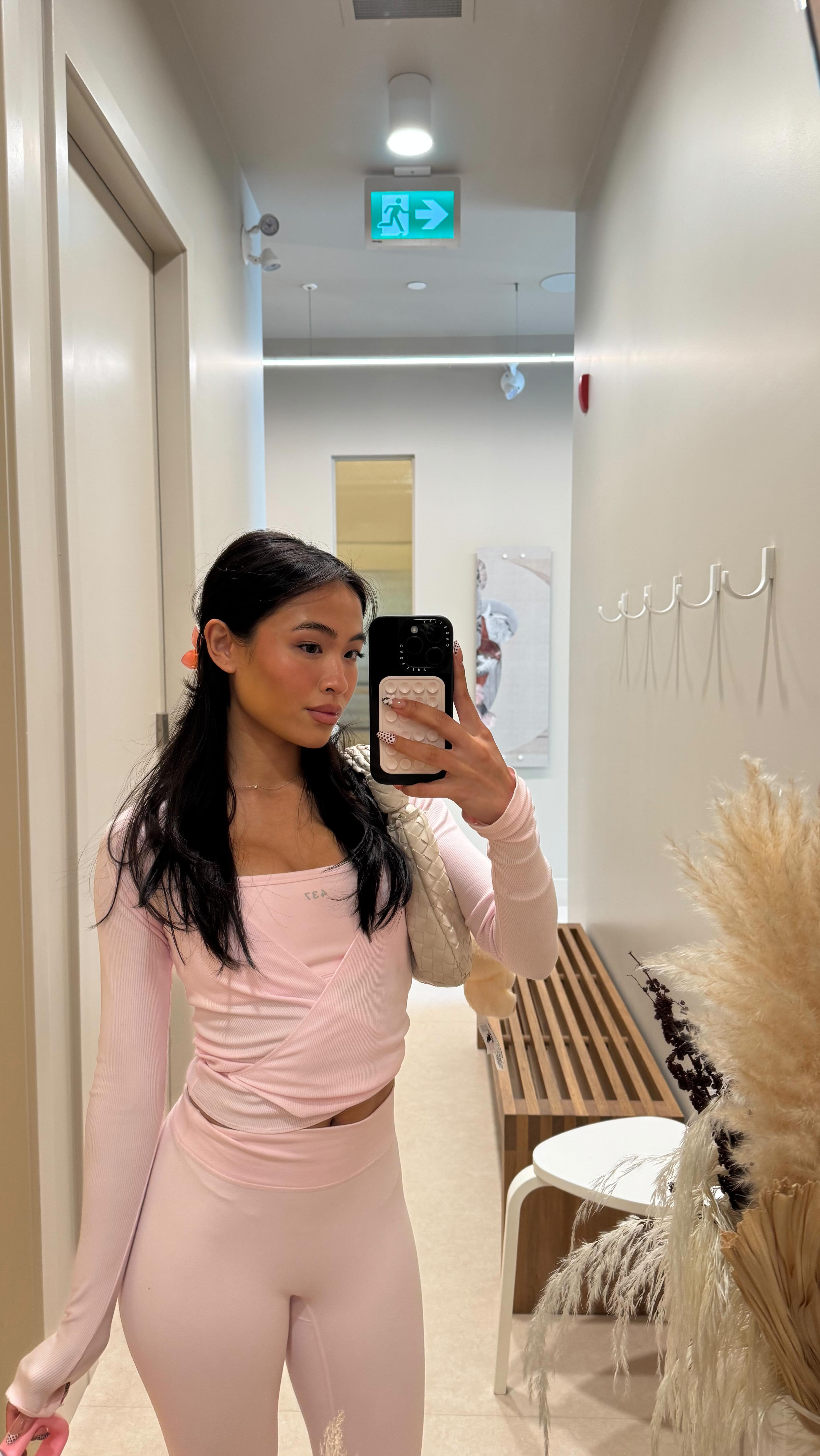 Instagram post by @roshelleflores_ for DearDahlia. Caption reads: from the mirror to the mat, my blush is a....