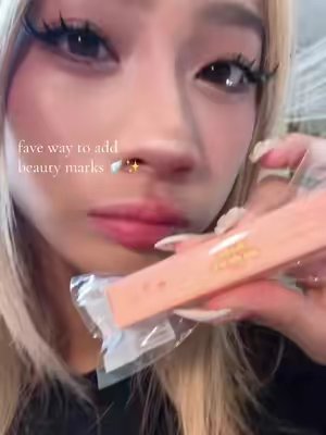 TikTok post by @seitinh for Babygodewy Beauty. Caption reads: @babygodewybeauty 🪽✨ | #babygodewy #fauxfreckles....