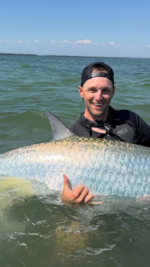 Instagram post by @capt_banks for Academy Sports + Outdoors. Caption reads: Absolute CHAOS hooked into a dream fish 🤯 Chasing....