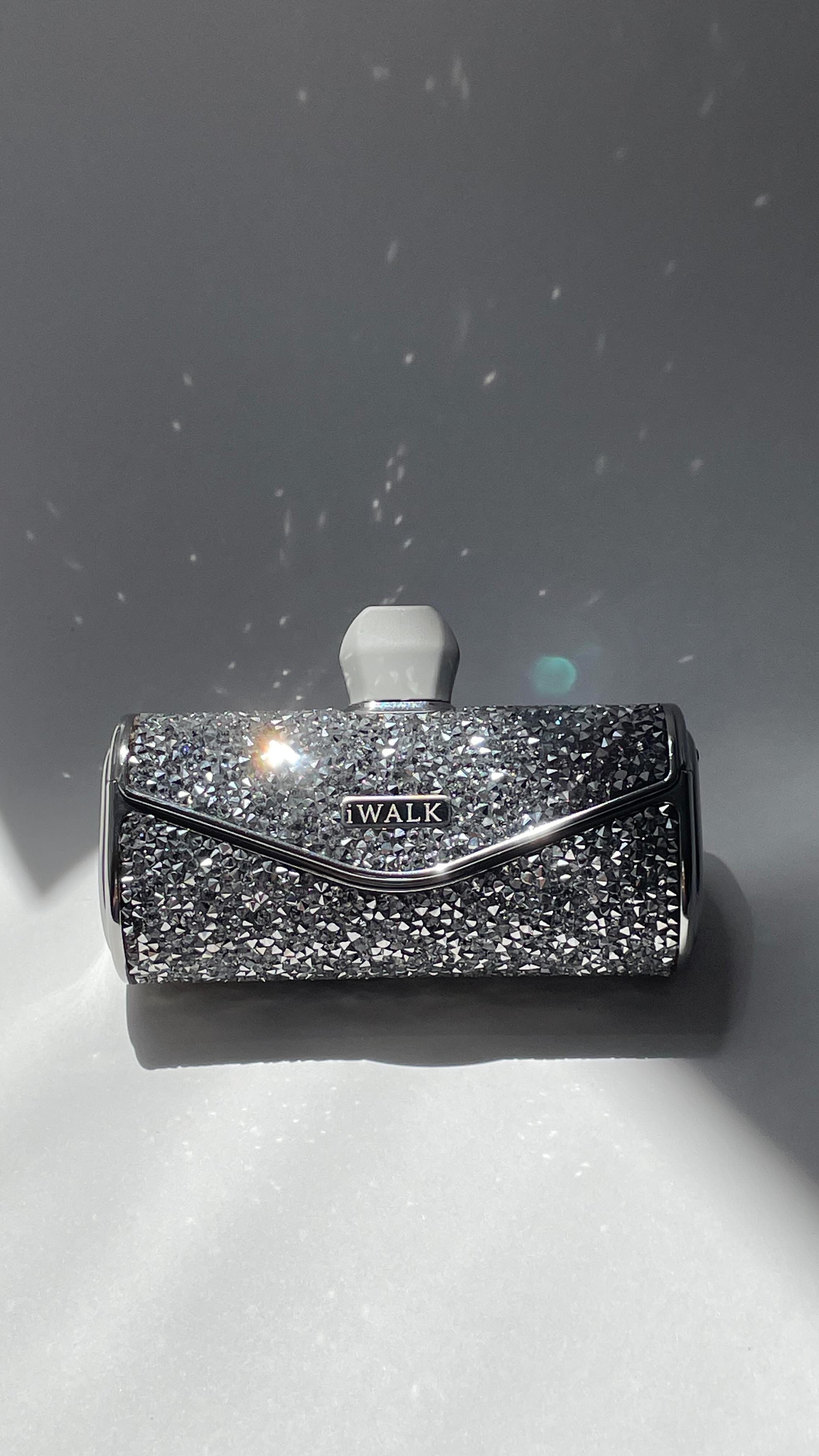 Instagram post by @sofy.zho for iWALK. Caption reads: Shining bright and charging right ⚡✨ @iwalk_global....