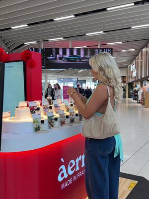 TikTok post by @charlottekitchinn for Aerre Perfumes. Caption reads: @Àerre Perfumes is now OPEN at the....