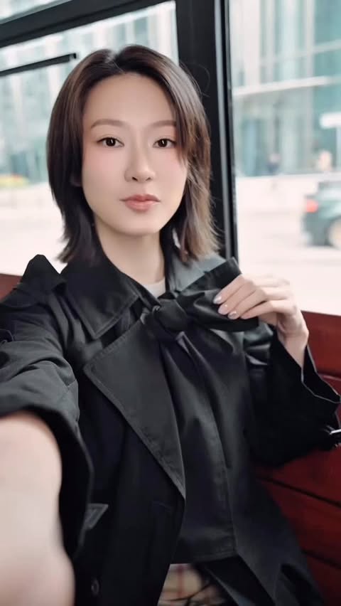Instagram post by @fish331 for Burberry. Caption reads: [...] London in spring- so I let my black Burberry....