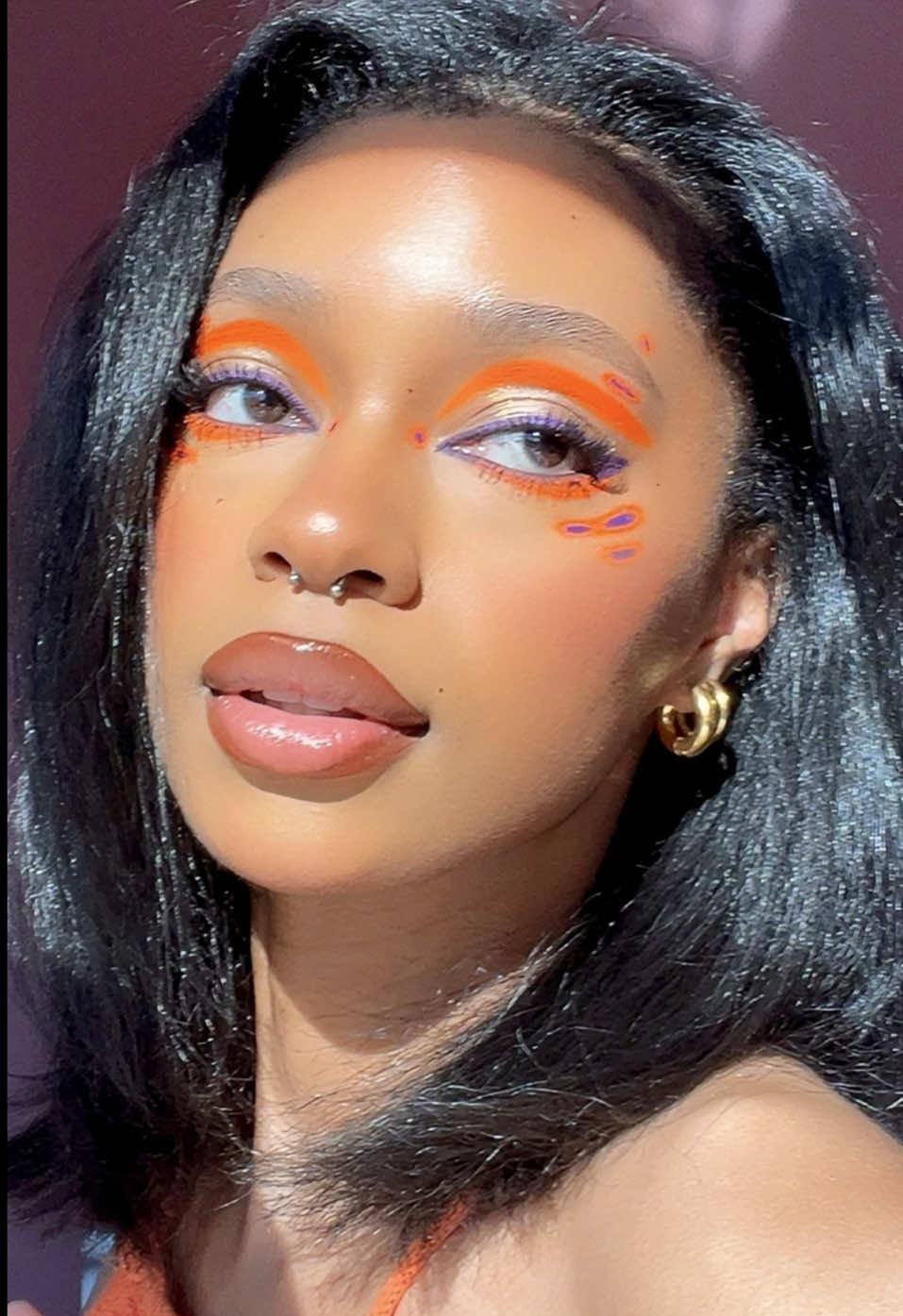 TikTok post by @lanayanette for About-face Beauty. Caption reads: a little fun summertime liner look 🧡☀️🏖️ ——....