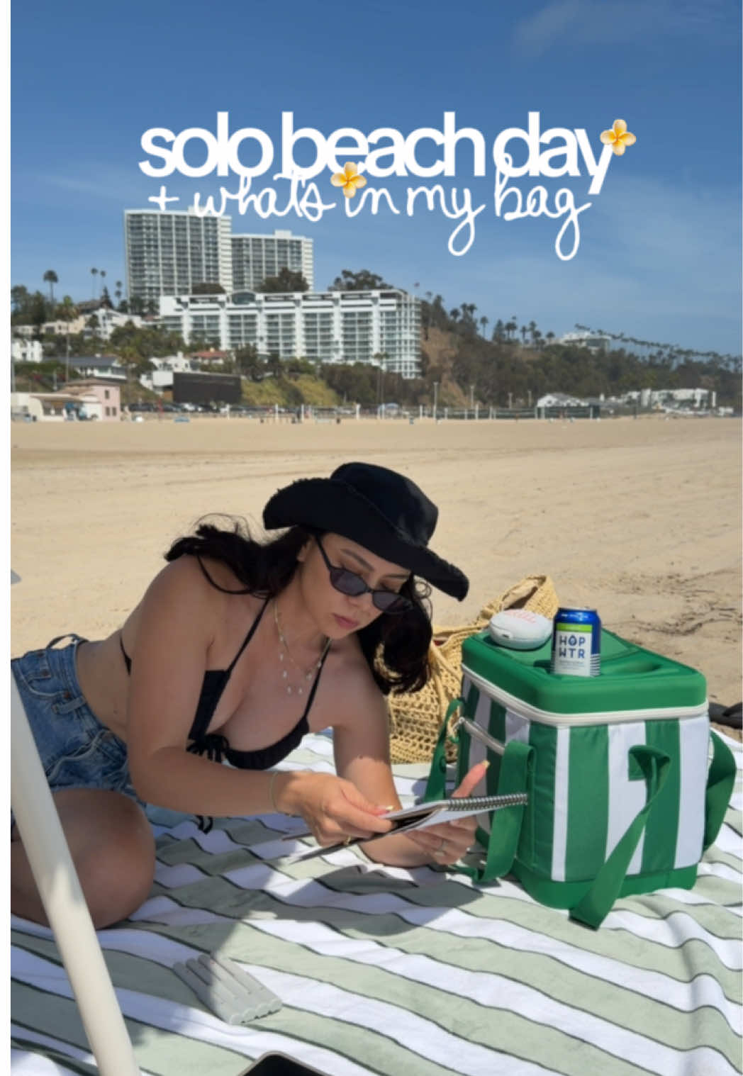 TikTok post by @ashley.adrian for Hopwtr. Caption reads: [...] @HOP WTR ! #solodate #beachdate....