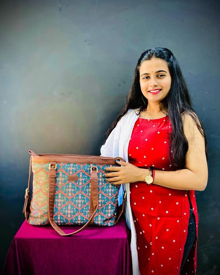 Instagram post by @rucha_prajapati_ for Hobo.Video. Caption reads: 'What’s in my Zouk Bag'
Functionality meets style....