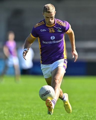 Instagram post by @humansofgaelic for Eos Elite. Caption reads: 🚨 WIN FREE GAA SOCKS IN YOUR TEAM COLOURS....