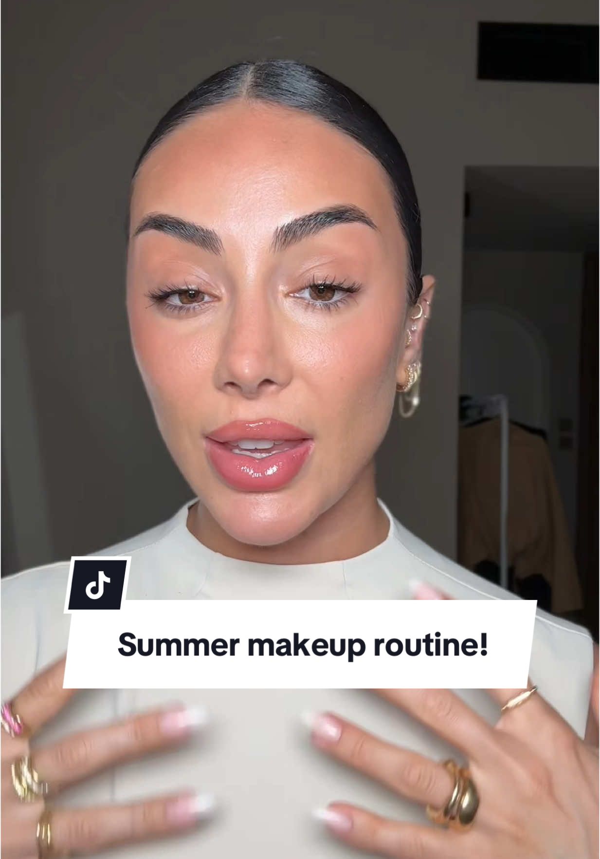 TikTok post by @themayaahmad for Hourglass Cosmetics. Caption reads: Summer is almost here! so here's my go to fresh....