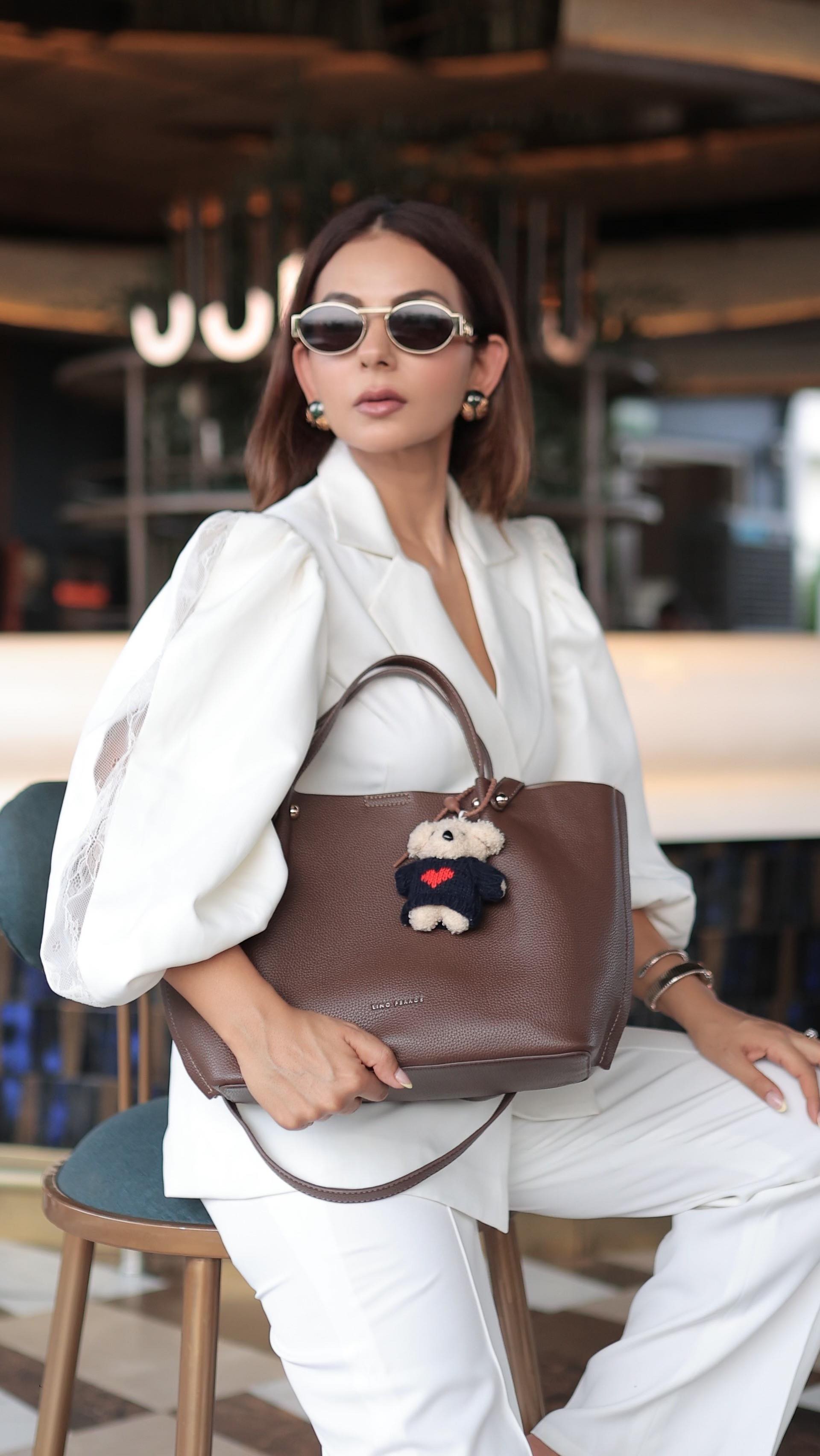 Instagram post by @gaurii_mehta_ for Lino Perros. Caption reads: Some bags carry essentials.
This one carries the....