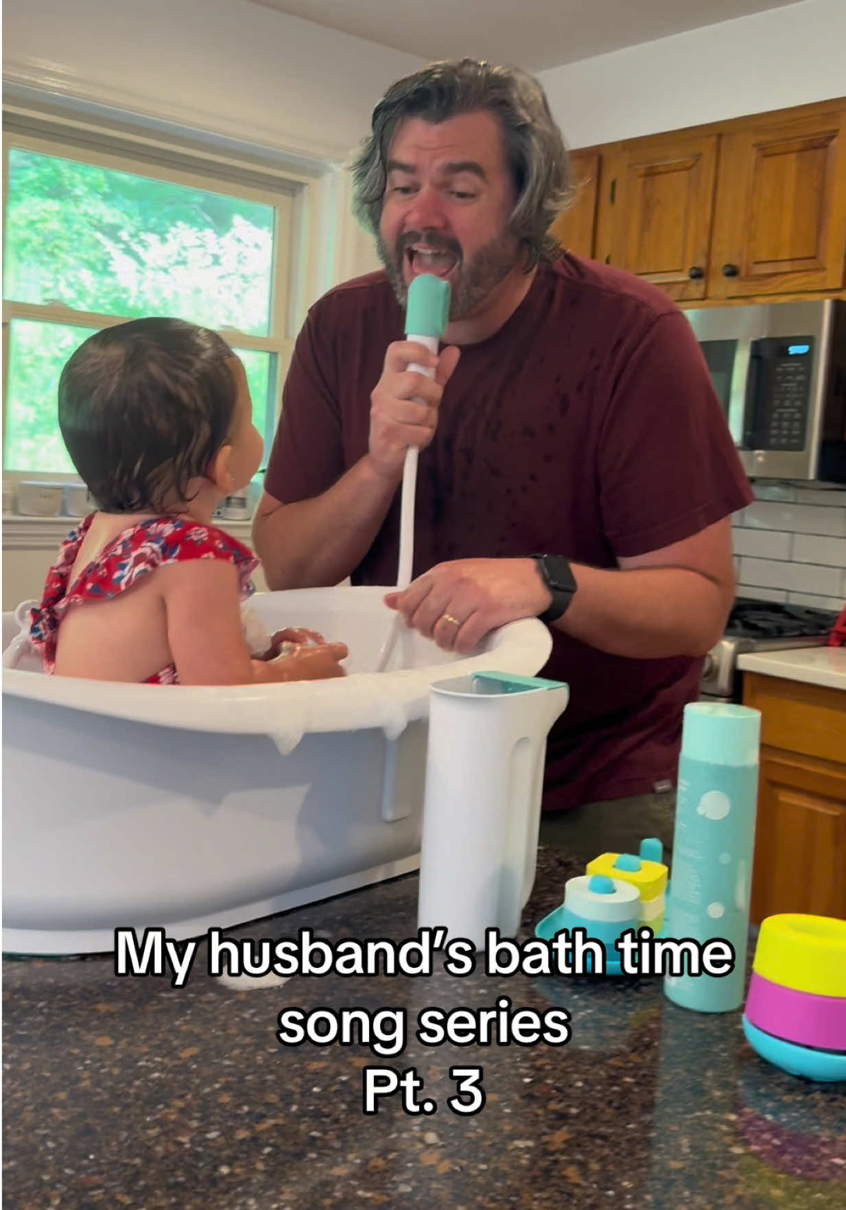 TikTok post by @giorginamartino for Fridababy. Caption reads: Before kids: singing in the shower. After kids:....
