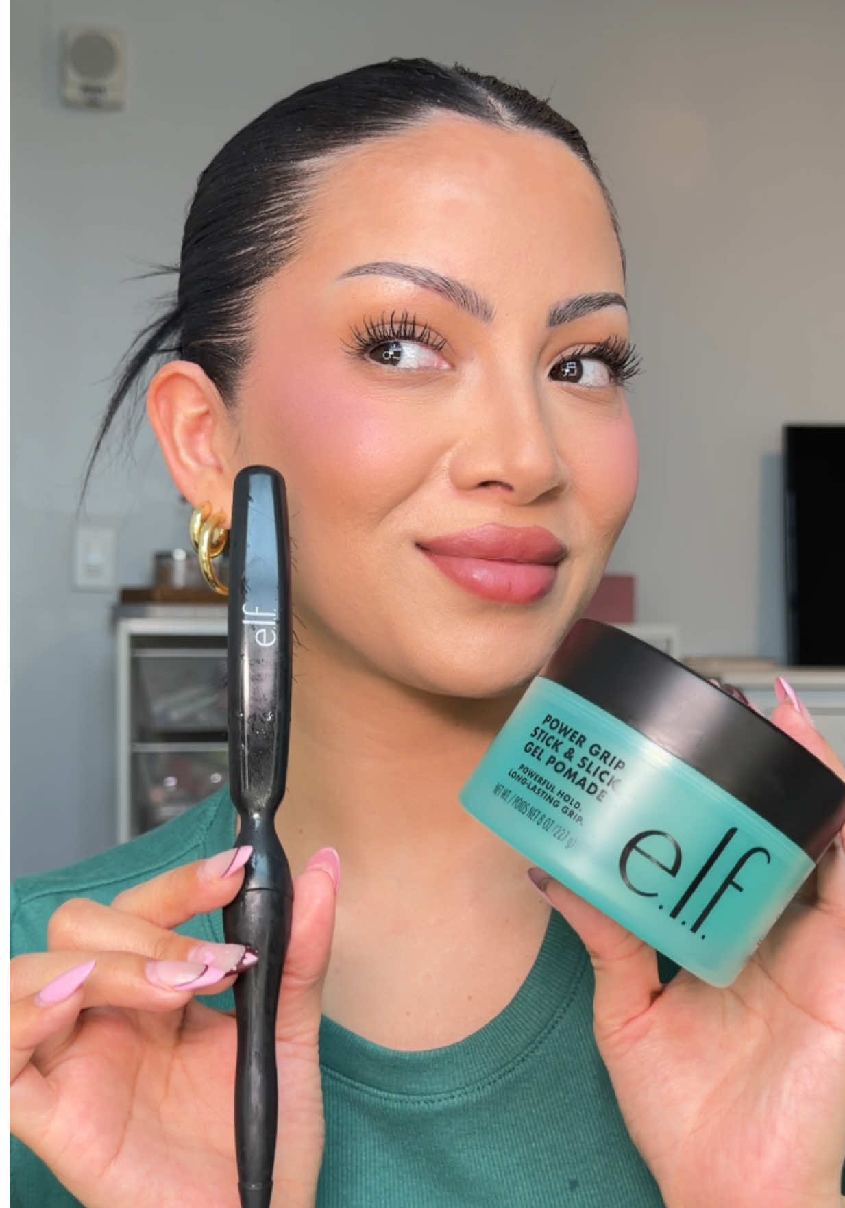 TikTok post by @glambervcruz for e.l.f. Cosmetics. Caption reads: @e.l.f. Cosmetics HAIR?! Power grip stick & [...].