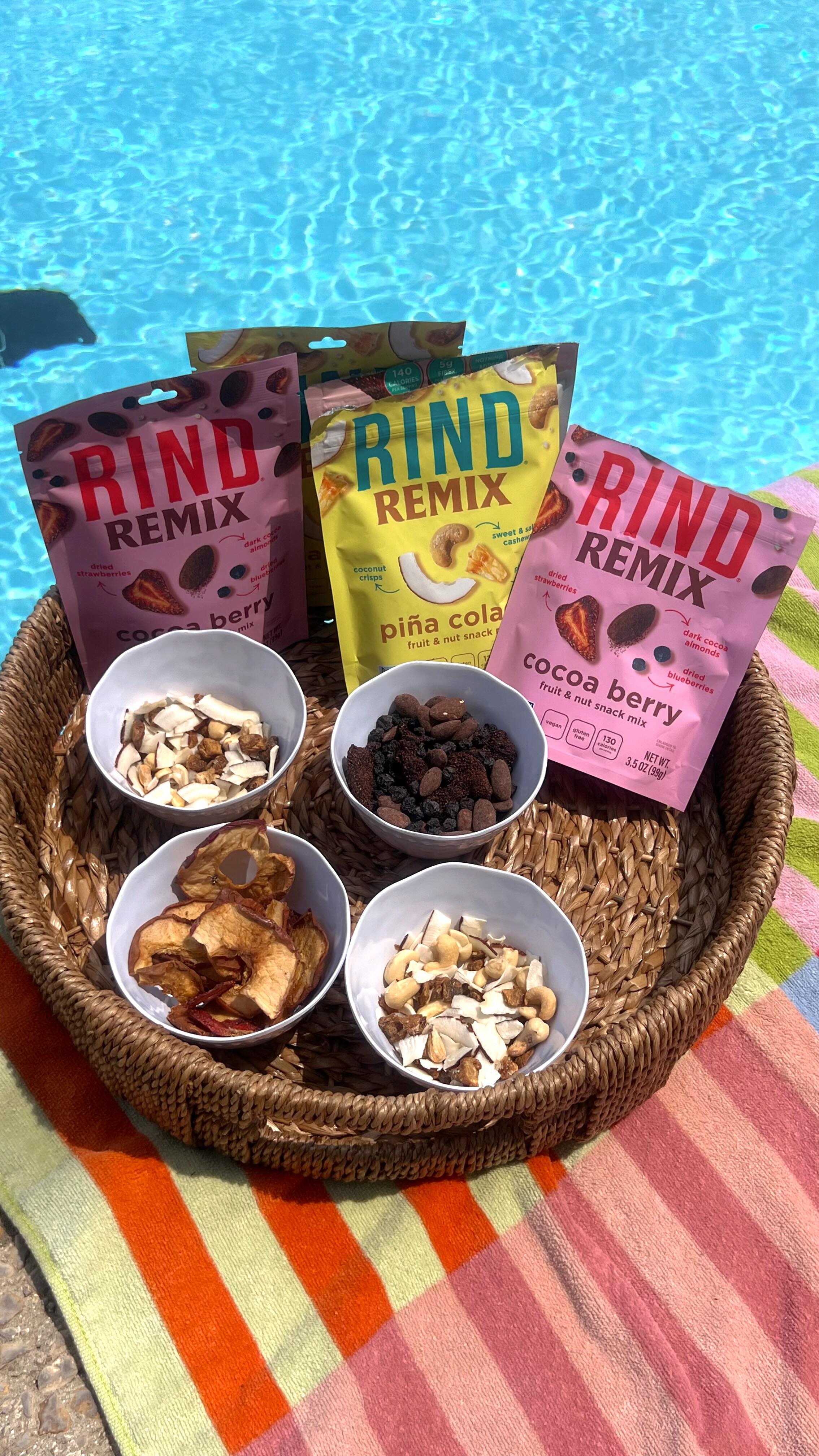 Instagram post by @theunofficialtourguidee for RIND Snacks. Caption reads: Pool snacks should be eassyyyy and @rindsnacks....