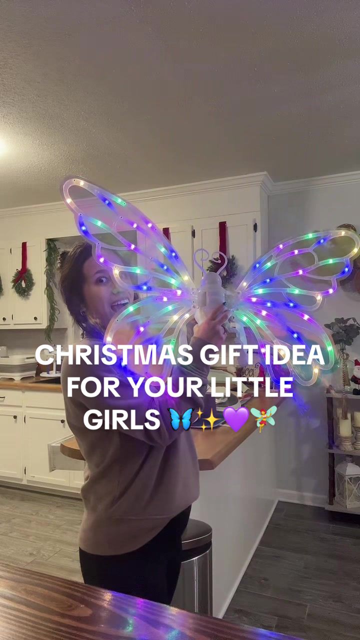 TikTok post by @themccoolfamily for Talgic. Caption reads: [...] #butterflywings #lightupwings #talgic....