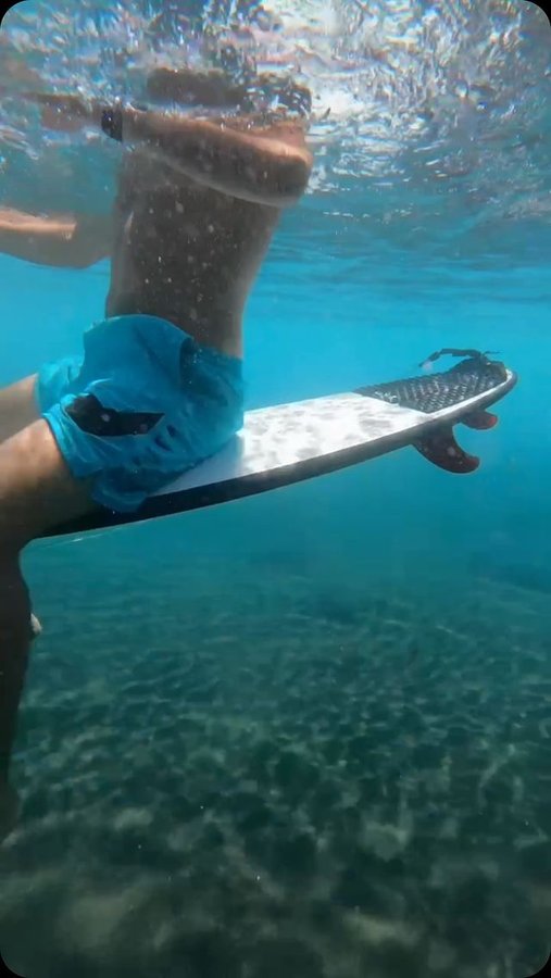 Instagram post by @alejandro_surfing for Nike Swim. Caption reads: 🌊🌊🌊🏄🌊🌊🌊.