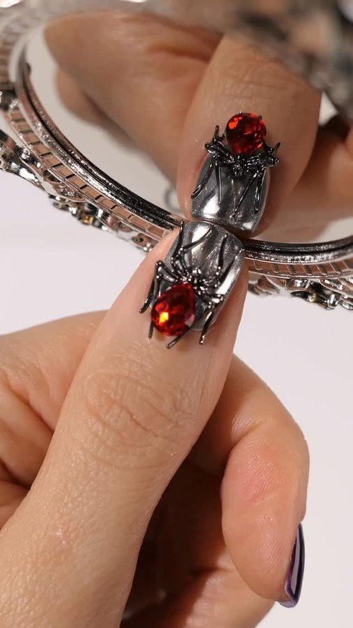 Instagram post by @danaturenails for BeetlesGelPolish. Caption reads: gothic halloween nails 👻 how to win this....