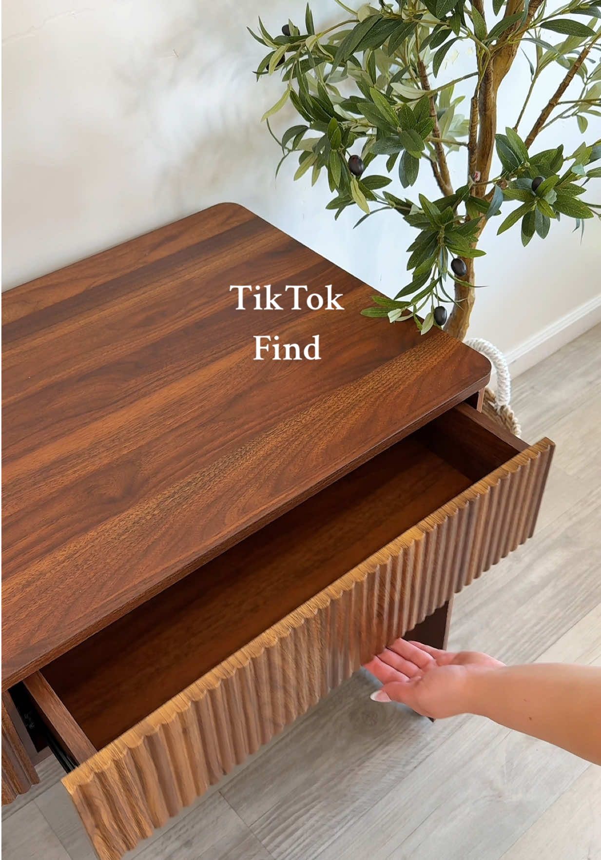 TikTok post by @lyndasedoud for Giratree. Caption reads: [...] or vanity which one would you choose?....