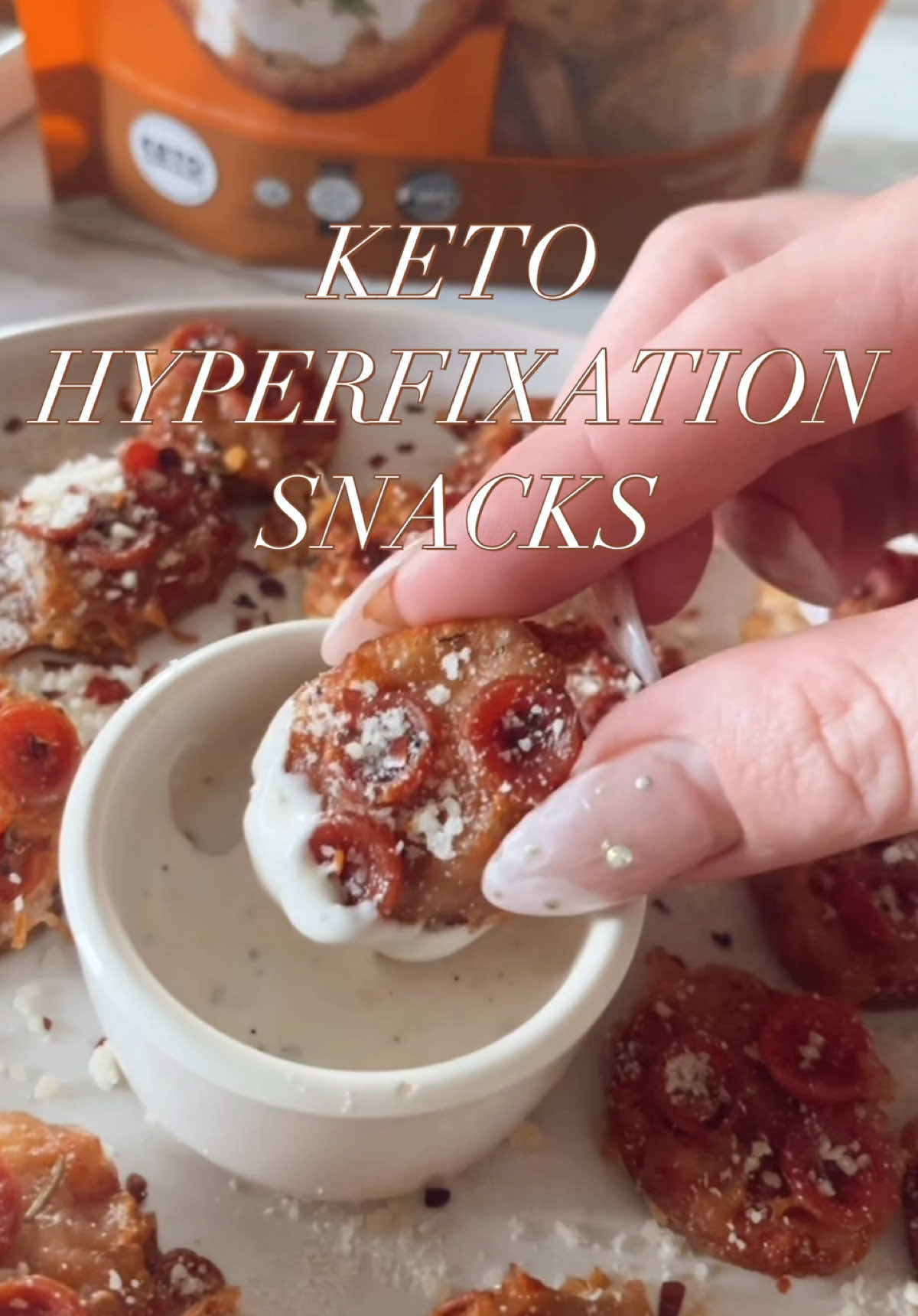 TikTok post by @conteketo for Trader Joe's. Caption reads: ✨KETO BITE-SIZED SNACKS✨details below👇🏼 If you....