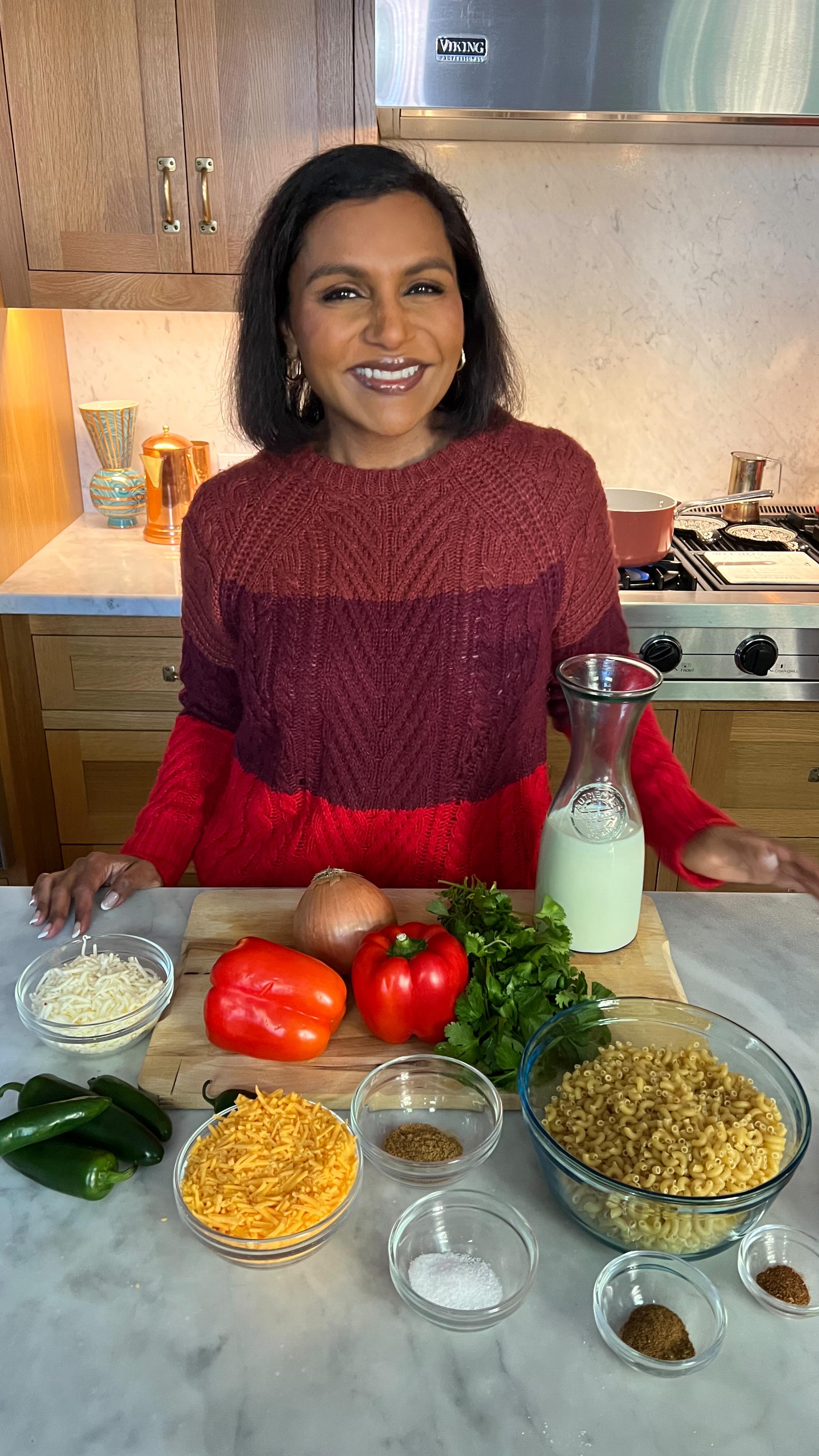 Instagram post by @mindykaling for gonnaneedmilk. Caption reads: I’m back! And this time cooking Indian-Americana....