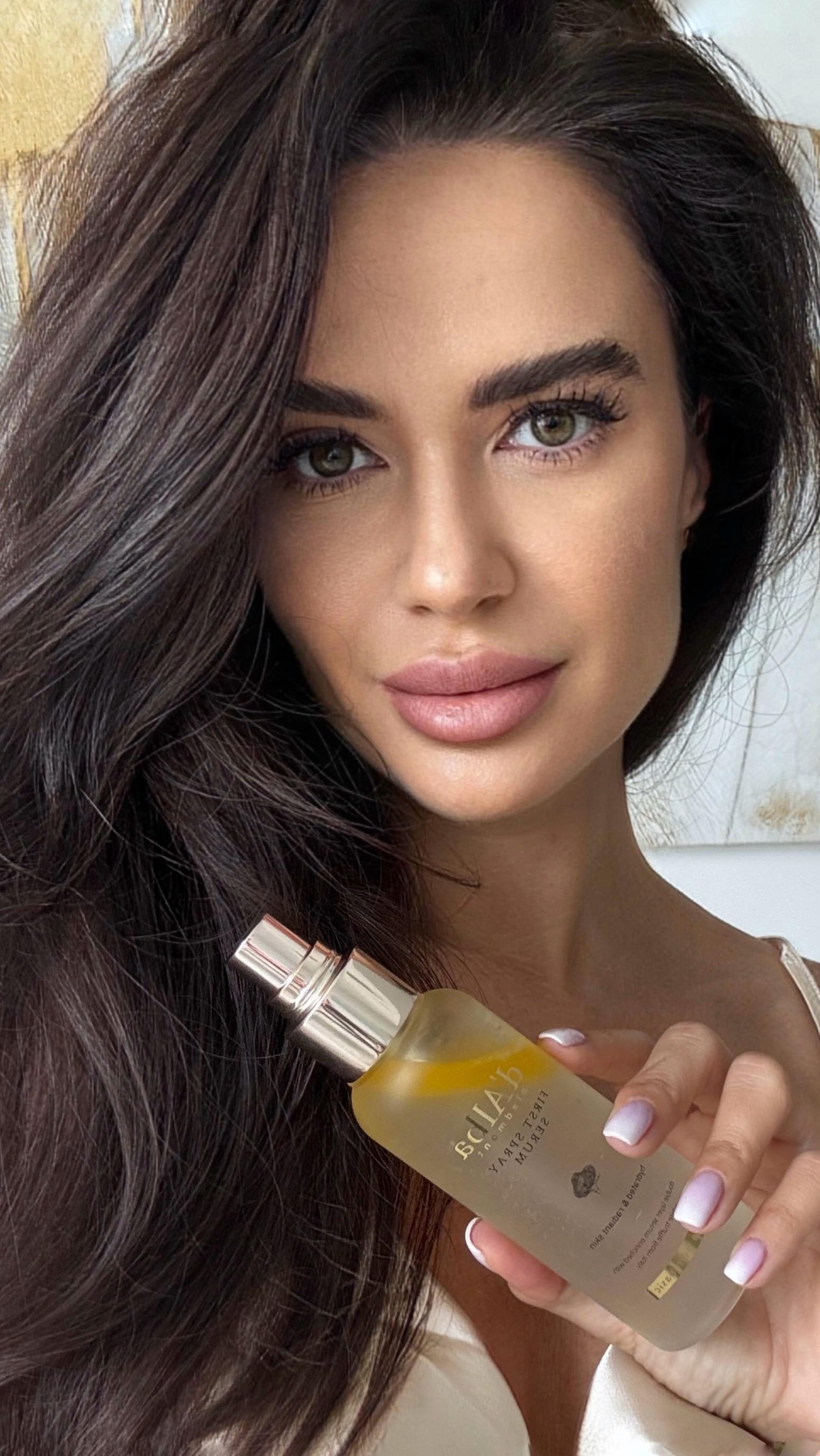 Instagram post by @metejnica for dalbaglobal. Caption reads: Glowing skin in one spray! ✨ This luxurious serum....