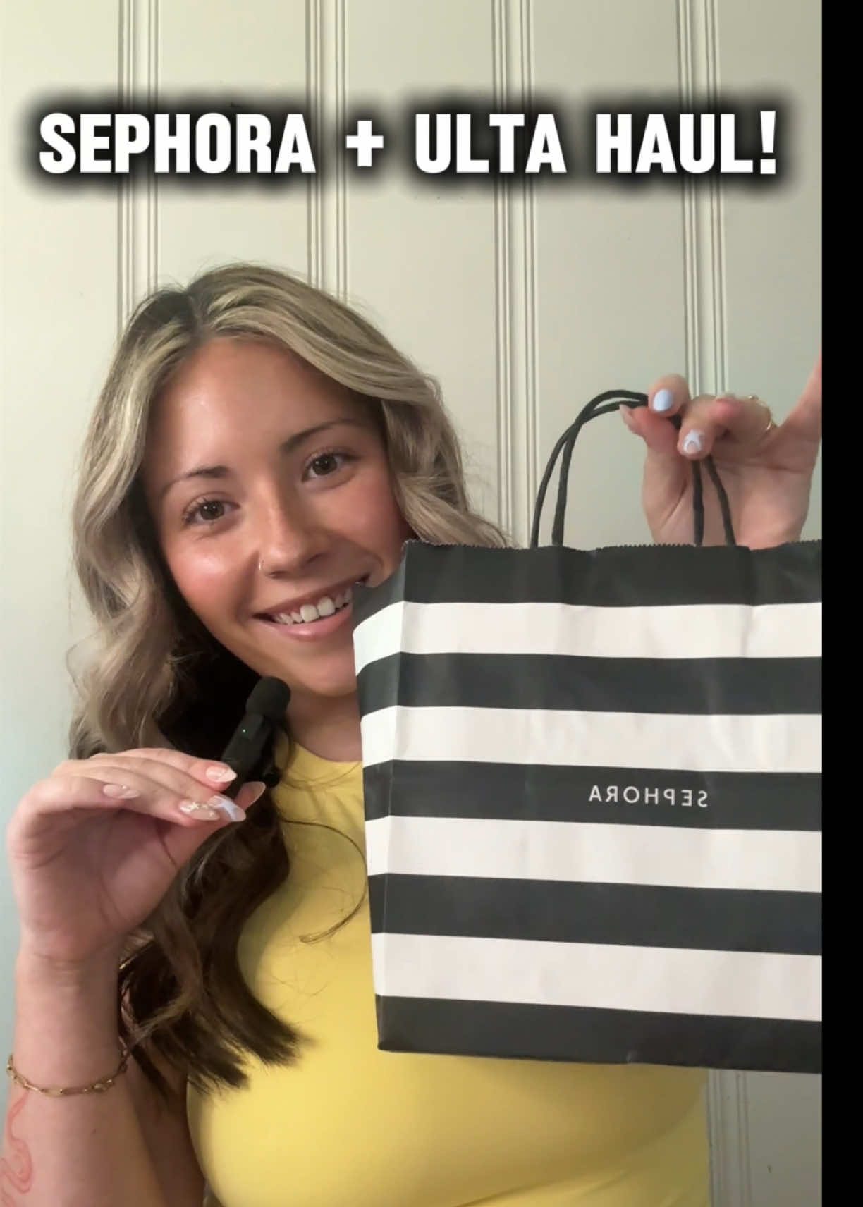 TikTok post by @miajcam for Emi Jay. Caption reads: [...] Haul! ♡ @rhode skin @Kylie Cosmetics @Emi....