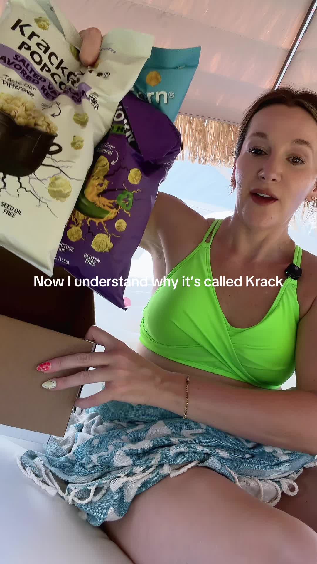 TikTok post by @amandanickathome for KrackCorn Popcorn. Caption reads: @KrackCorn Popcorn my all time favorite snack is....