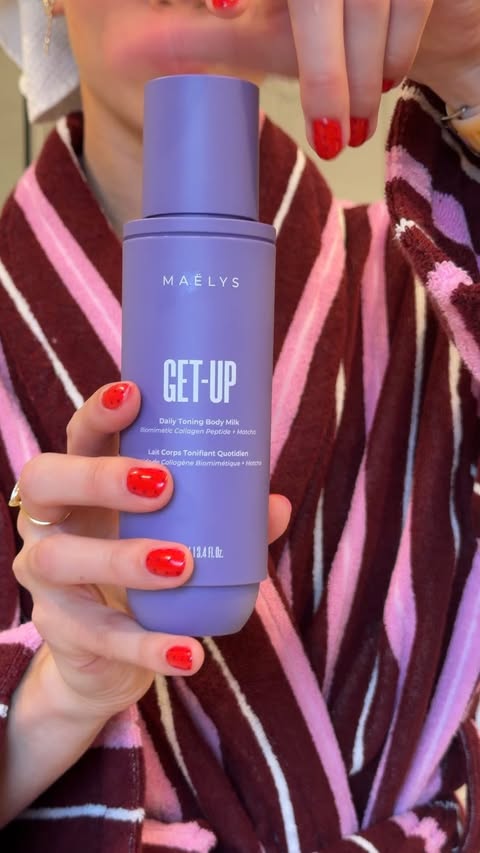 Instagram post by @juliagmonty for MAËLYS. Caption reads: AD I @maelys_cosmetics GET-UP Body Toning Milk is....