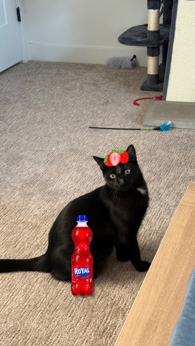 Instagram post by @katkat.manimtim for Royal pharmacy. Caption reads: OMG! May Royal Tru Strawberry na pala? 💋🍓 As a....