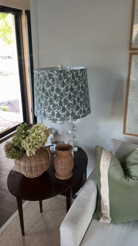 Instagram post by @emmalinemae for At Home. Caption reads: [...] my living room mood board to life with....