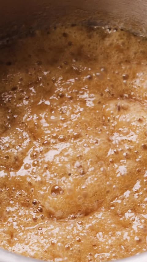 Instagram post by @francescadzani for Delish. Caption reads: If you have Saltine Crackers, butter, brown sugar....