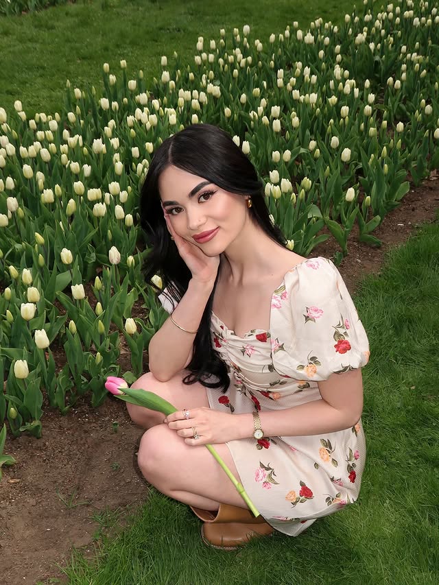 Instagram post by @jdlovee for JustFab. Caption reads: [...] 🌷 🌹 dress - @heartloom 👢 boots -....