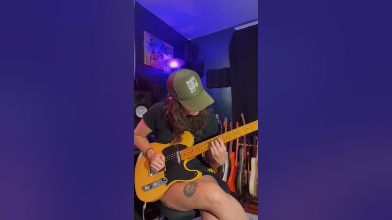 YouTube post by @fender for Fender. Caption reads: Watch Gina Gleason shred on the new American Ultra....