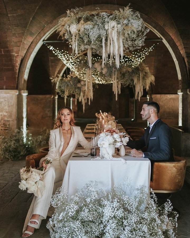 Instagram post by @buushiigraphy for Galia Lahav. Caption reads: THE MODERN ROMANCE 🇮🇹 ✨ #destinationwedding....
