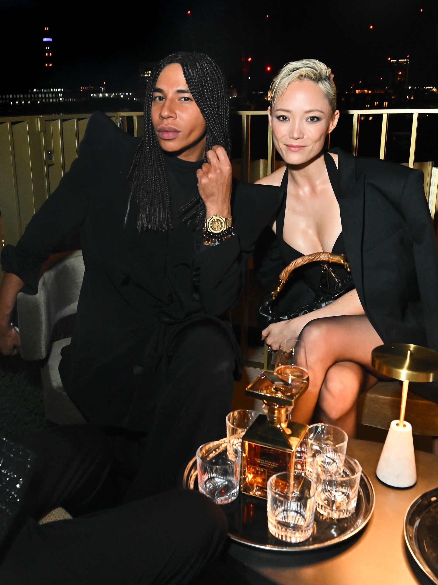 Instagram post by @pom.klementieff for Johnnie Walker. Caption reads: #ad A fun night with friends celebrating Johnnie....