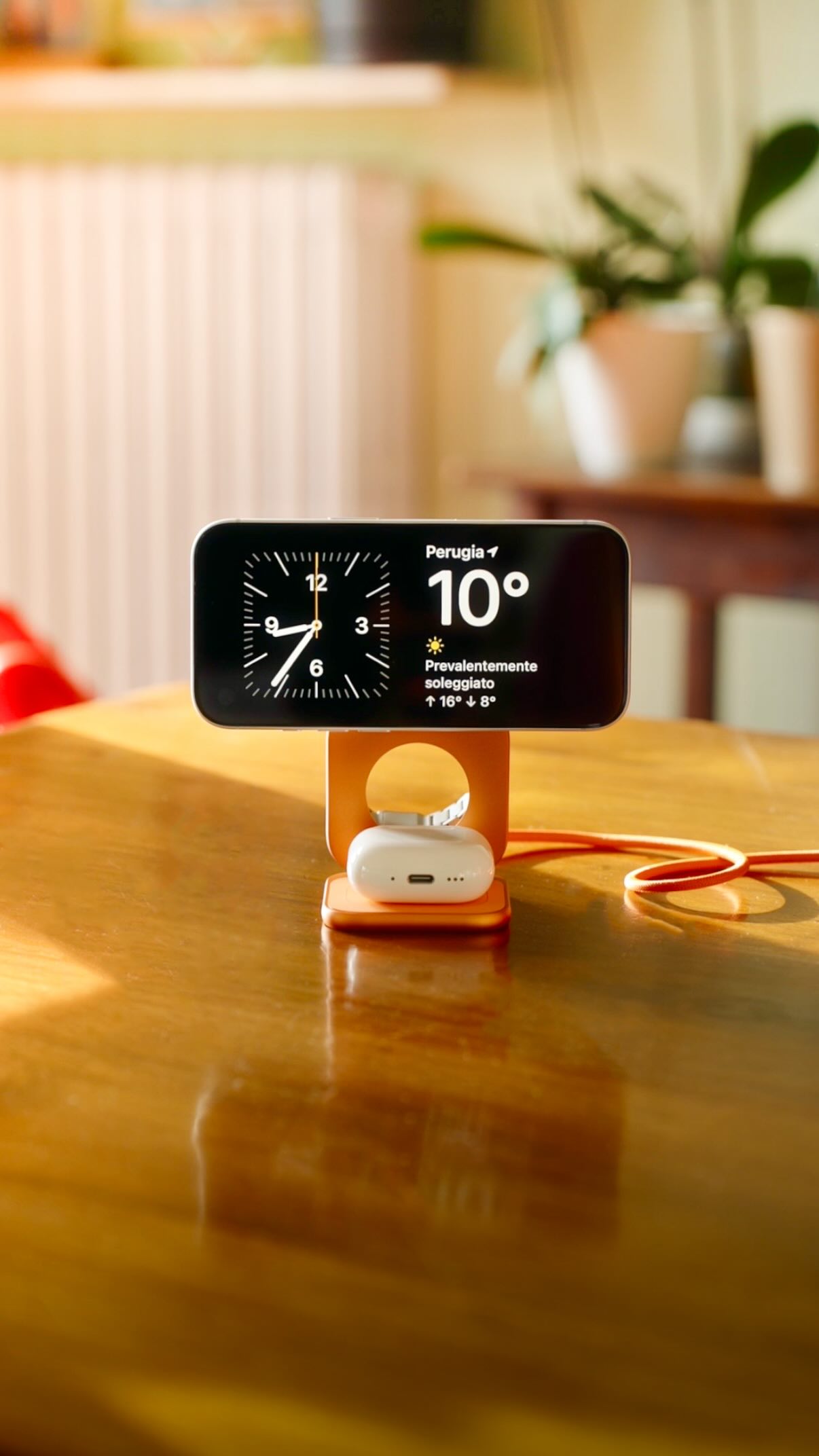 Instagram post by @iandreamosca for KUXIU. Caption reads: if you have the orange iPhone, this is for you....