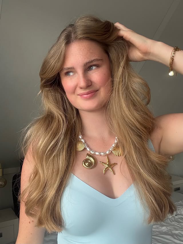 Instagram post by @marjetvdpijlx for LOAVIES. Caption reads: 🩵🐚✨ Necklace & top from @loavies #loavies....